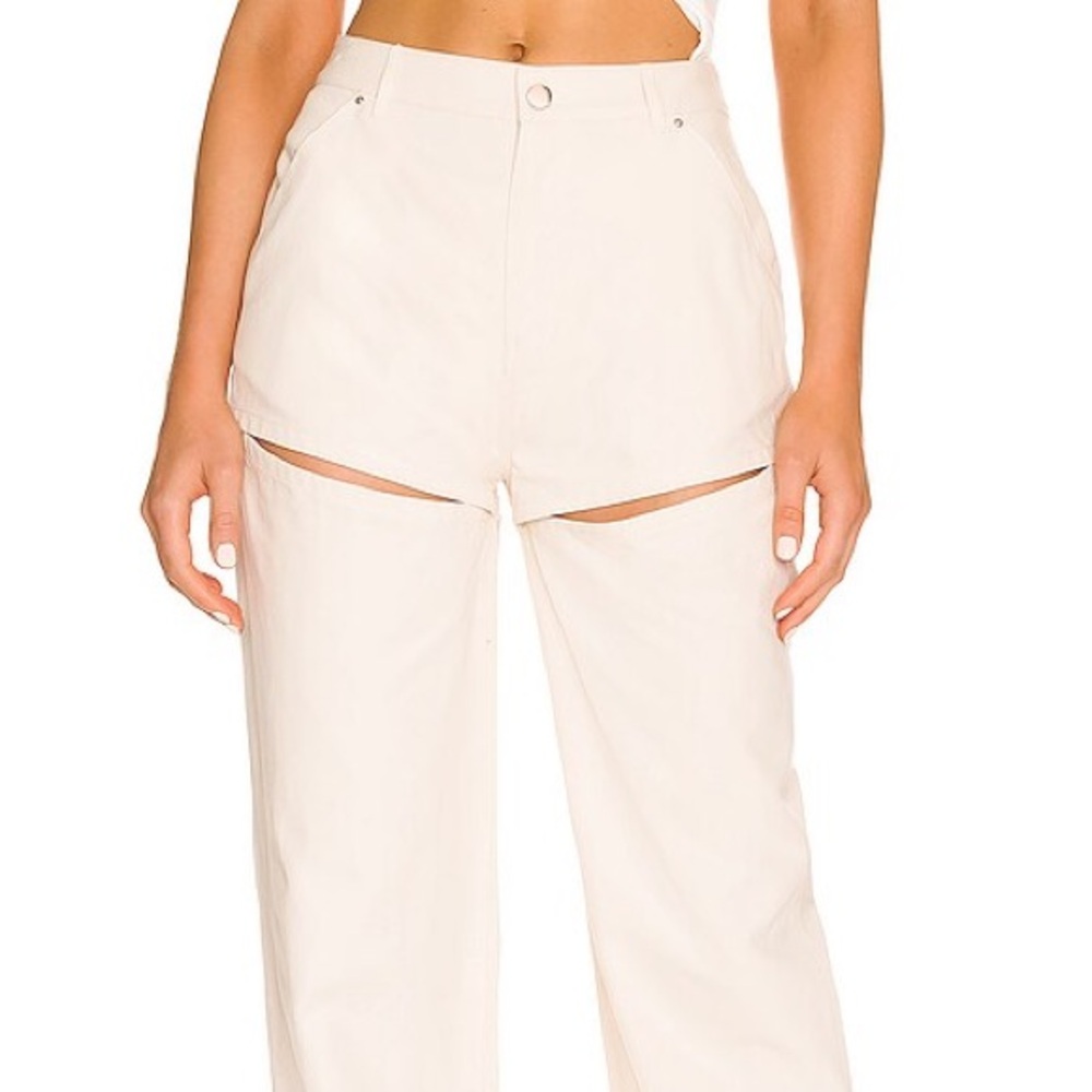 Tan pants with slits